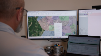 over the shoulder view of CrescentLink on a computer screen